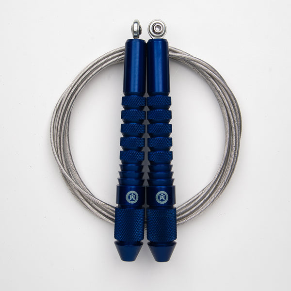 Corde à sauter bleu avec câble enrobé vert